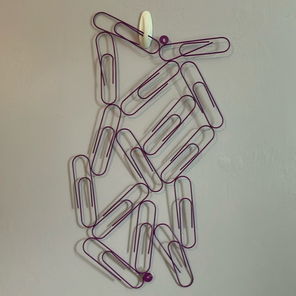 Purple paper clip bulletin board